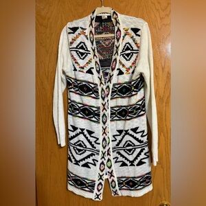 Pinklicious cardigan, size large.